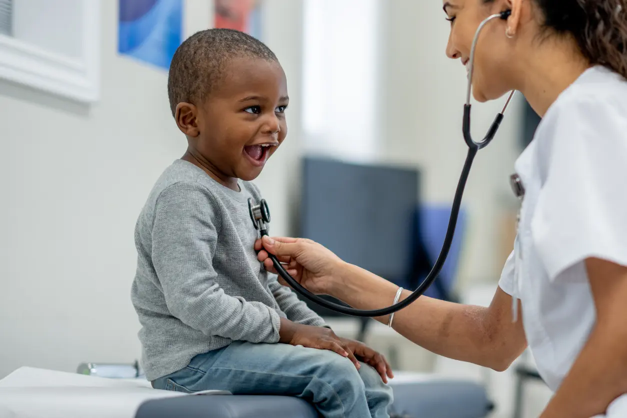 A nurse treating a patient