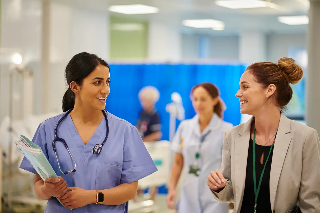 A healthcare administrator and a nurse